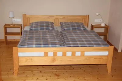 Ein Bett oder Betten in einem Zimmer der Unterkunft Bauernhaus in der Bachstraße