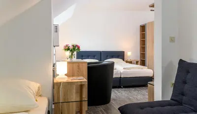 Ein Bett oder Betten in einem Zimmer der Unterkunft Hotel Krone