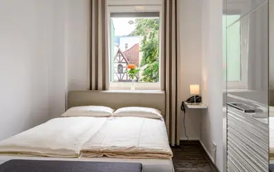 Ein Bett oder Betten in einem Zimmer der Unterkunft Hotel Krone