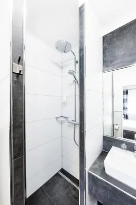 Ein Badezimmer in der Unterkunft Hochwald Lodge