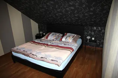 Ein Bett oder Betten in einem Zimmer der Unterkunft Ferienwohnung Panoramaweg