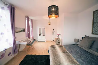 Ein Bett oder Betten in einem Zimmer der Unterkunft DesignLodge Apartments