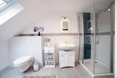Ein Badezimmer in der Unterkunft DesignLodge Apartments