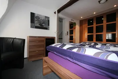 Ein Bett oder Betten in einem Zimmer der Unterkunft Ferienhaus DaVinci