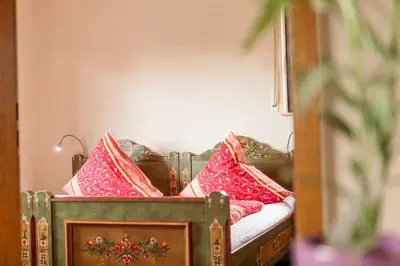 Ein Bett oder Betten in einem Zimmer der Unterkunft Landgasthaus Zum Kreuzberg