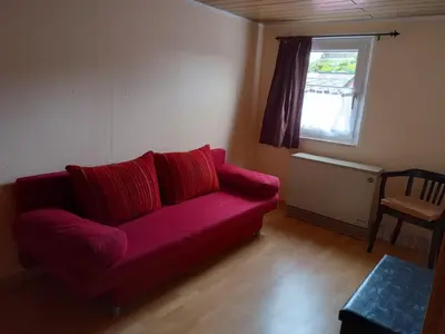 Ein Sitzbereich in der Unterkunft Ferienwohnung In der Kehr