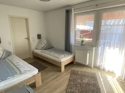 Ein Bett oder Betten in einem Zimmer der Unterkunft Privatzimmer Hoffmann