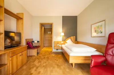 Ein Bett oder Betten in einem Zimmer der Unterkunft Menschels Vitalresort