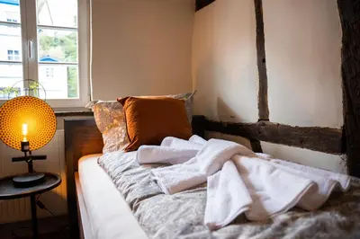 Ein Bett oder Betten in einem Zimmer der Unterkunft Haus zum Ring