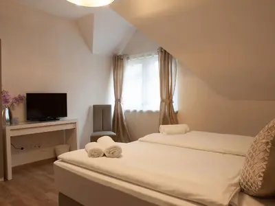 Ein Bett oder Betten in einem Zimmer der Unterkunft Hotel Ravene