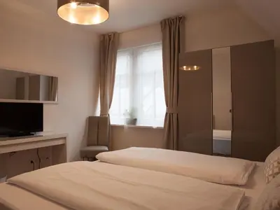 Ein Bett oder Betten in einem Zimmer der Unterkunft Hotel Ravene