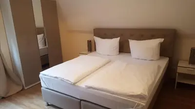 Ein Bett oder Betten in einem Zimmer der Unterkunft Hotel Ravene