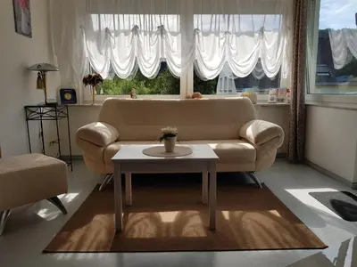 Ein Sitzbereich in der Unterkunft Ferienwohnung Eigner