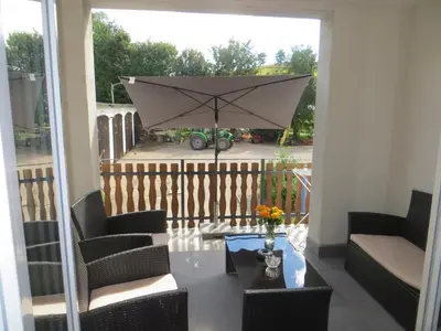 Ein Balkon oder eine Terrasse in der Unterkunft Ferienwohnungen Grafenfelder Hof