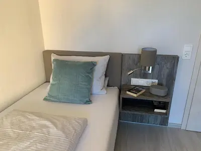 Ein Bett oder Betten in einem Zimmer der Unterkunft Weingut Stiftshof