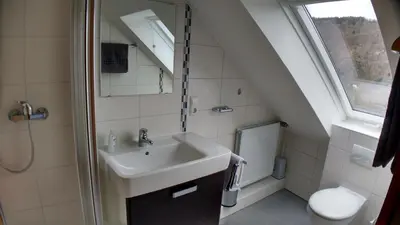Ein Badezimmer in der Unterkunft Weingut Stiftshof