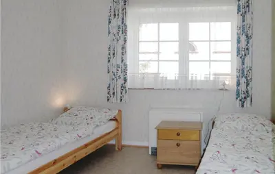 Ein Bett oder Betten in einem Zimmer der Unterkunft Cozy Apartment In Gerolstein-Müllenborn