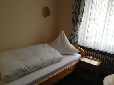 Ein Bett oder Betten in einem Zimmer der Unterkunft Yumi Hotel Sushi-Steaks & Friends