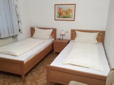 Ein Bett oder Betten in einem Zimmer der Unterkunft Ferienwohnung Sonneck