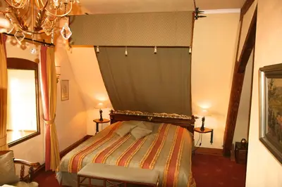 Ein Bett oder Betten in einem Zimmer der Unterkunft Hotel Burg Arras