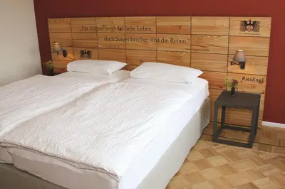 Ein Bett oder Betten in einem Zimmer der Unterkunft Gut Hermannsberg, Gästehaus