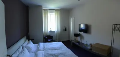 Ein Bett oder Betten in einem Zimmer der Unterkunft Gut Hermannsberg, Gästehaus