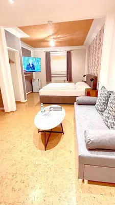 Ein Sitzbereich in der Unterkunft Hotel zur Loreley - Garni