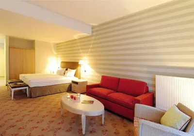 Ein Bett oder Betten in einem Zimmer der Unterkunft Landhotel Sanct Peter