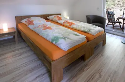 Ein Bett oder Betten in einem Zimmer der Unterkunft Rhein-Mosel-Ferienhaus
