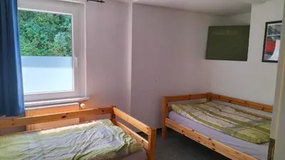 Ein Bett oder Betten in einem Zimmer der Unterkunft Ferienwohnung am Nürburgring 2.OG