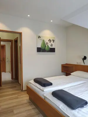 Ein Bett oder Betten in einem Zimmer der Unterkunft Alt Reinsport