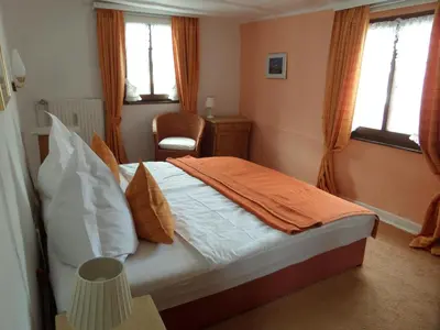 Ein Bett oder Betten in einem Zimmer der Unterkunft Historisches Fachwerkhaus