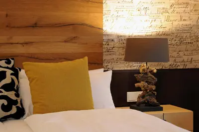 Ein Bett oder Betten in einem Zimmer der Unterkunft MICHELS Wellness- & Wohlfühlhotel