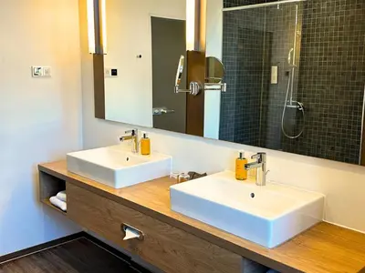 Ein Badezimmer in der Unterkunft Augustiner Hotel