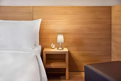 Ein Bett oder Betten in einem Zimmer der Unterkunft Nürburgring Ferienpark