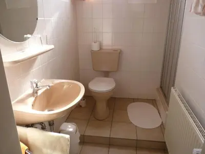 Ein Badezimmer in der Unterkunft Pension Rehschopp