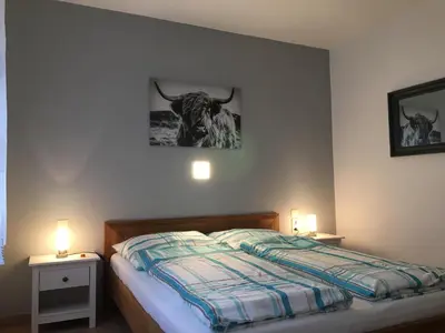 Ein Bett oder Betten in einem Zimmer der Unterkunft Pension Rehschopp
