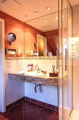 Ein Badezimmer in der Unterkunft Hotel Molitors Mühle