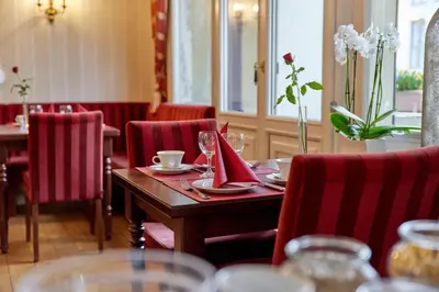 Ein Sitzbereich in der Unterkunft Hotel Sankt Maximilian 