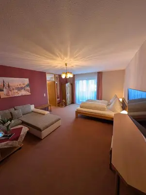 Ein Bett oder Betten in einem Zimmer der Unterkunft Zenners Landhotel