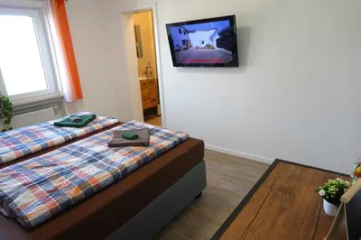 Ein Bett oder Betten in einem Zimmer der Unterkunft Speedys Bed & Breakfast