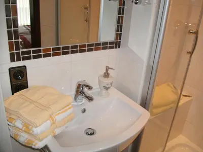 Ein Badezimmer in der Unterkunft Gästehaus Heidi