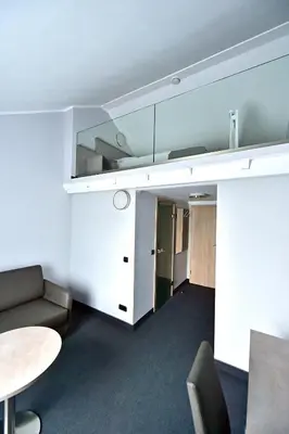 Ein Sitzbereich in der Unterkunft GT3 Hotel
