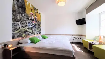 Ein Bett oder Betten in einem Zimmer der Unterkunft Winkelwerkstatt Hotel