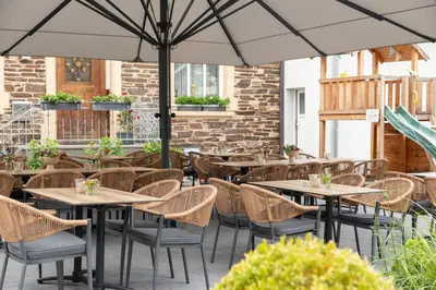 Ein Restaurant oder anderes Speiselokal in der Unterkunft Gästehaus Kiebel