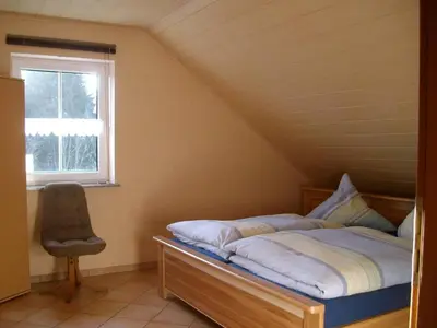 Ein Bett oder Betten in einem Zimmer der Unterkunft Ferienwohnung Mastiaux
