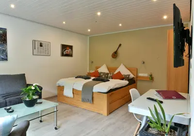 Ein Bett oder Betten in einem Zimmer der Unterkunft Appartements Moselblick