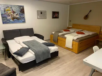 Ein Bett oder Betten in einem Zimmer der Unterkunft Appartements Moselblick