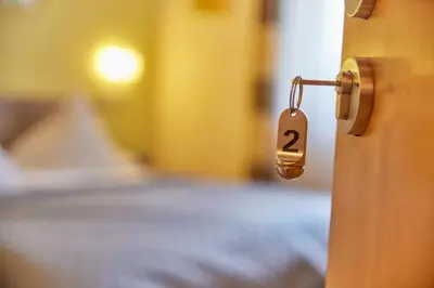 Ein Bett oder Betten in einem Zimmer der Unterkunft Hotel Restaurant Würzig in Ürzig
