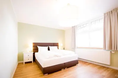 Ein Bett oder Betten in einem Zimmer der Unterkunft Gästehaus C.H.Berres Ürzig-Mosel